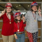Claire, Lauren, and Leah celebrate State Special Olympic victory.