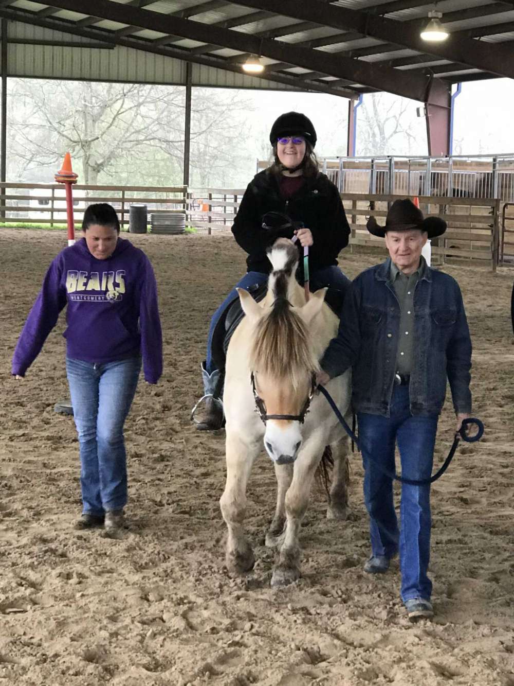 Ladana Igler rides a horse at the SIRE location in Spring.