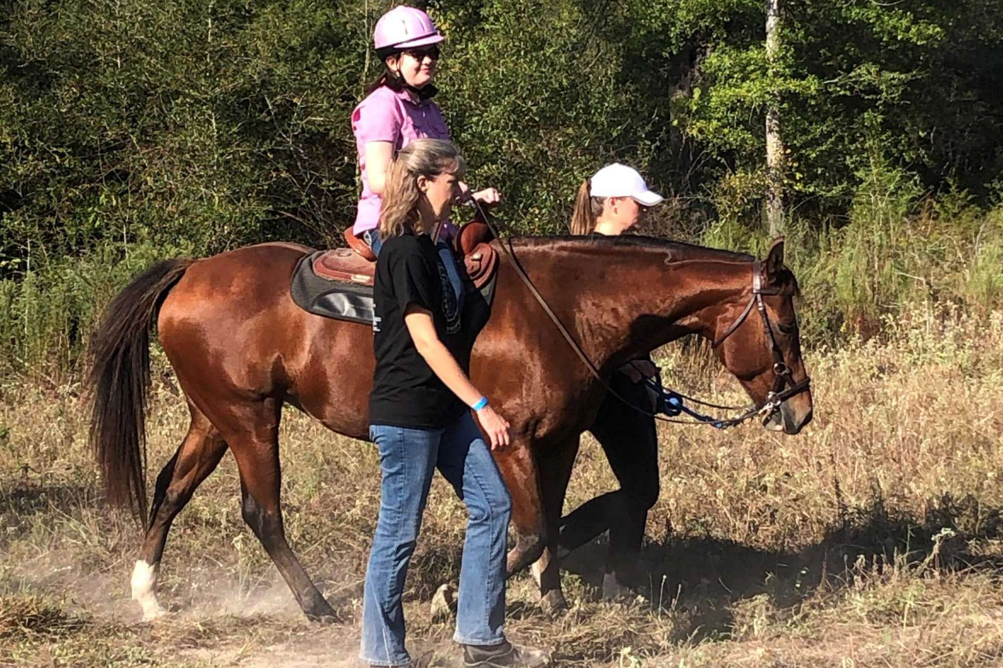 Ladana Igler rides a horse at the SIRE location in Spring.